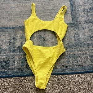 yellow one piece with cut outs